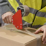 man-warehouse-working-with-packages